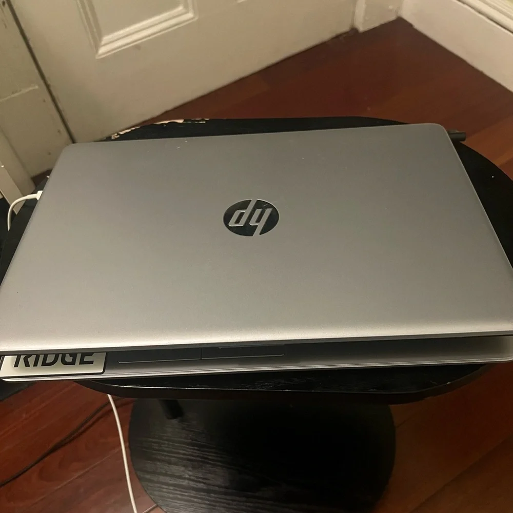HP Silver Laptop with Full-Size Keyboard and Sleek Design